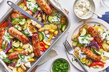 Greek-style sausage and butter bean traybake