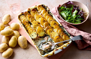 Jersey-Royal-topped salmon and spinach pie