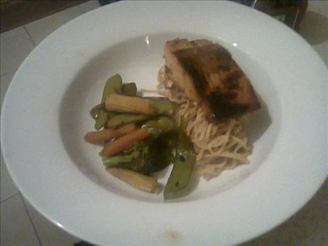 Asian salmon with stir fry vegetables and noodles