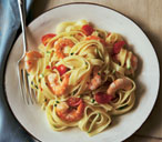 Chilli prawns with courgette and tagliatelle