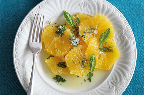 Oranges with citrus syrup and mint sugar