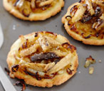Gluten-free sardine and onion mini pizzas