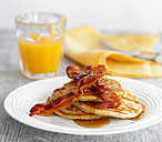 Pancakes with maple syrup and bacon