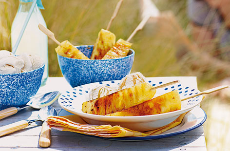 Pineapple skewers with vanilla syrup