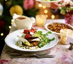 Potato rosti with roasted tomatoes, chicory and Gorgonzola