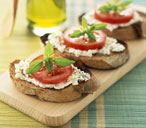 Goat's cheese, tomato and basil crostini