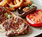 Sirloin steak with golden onion rings | Tesco Real Food