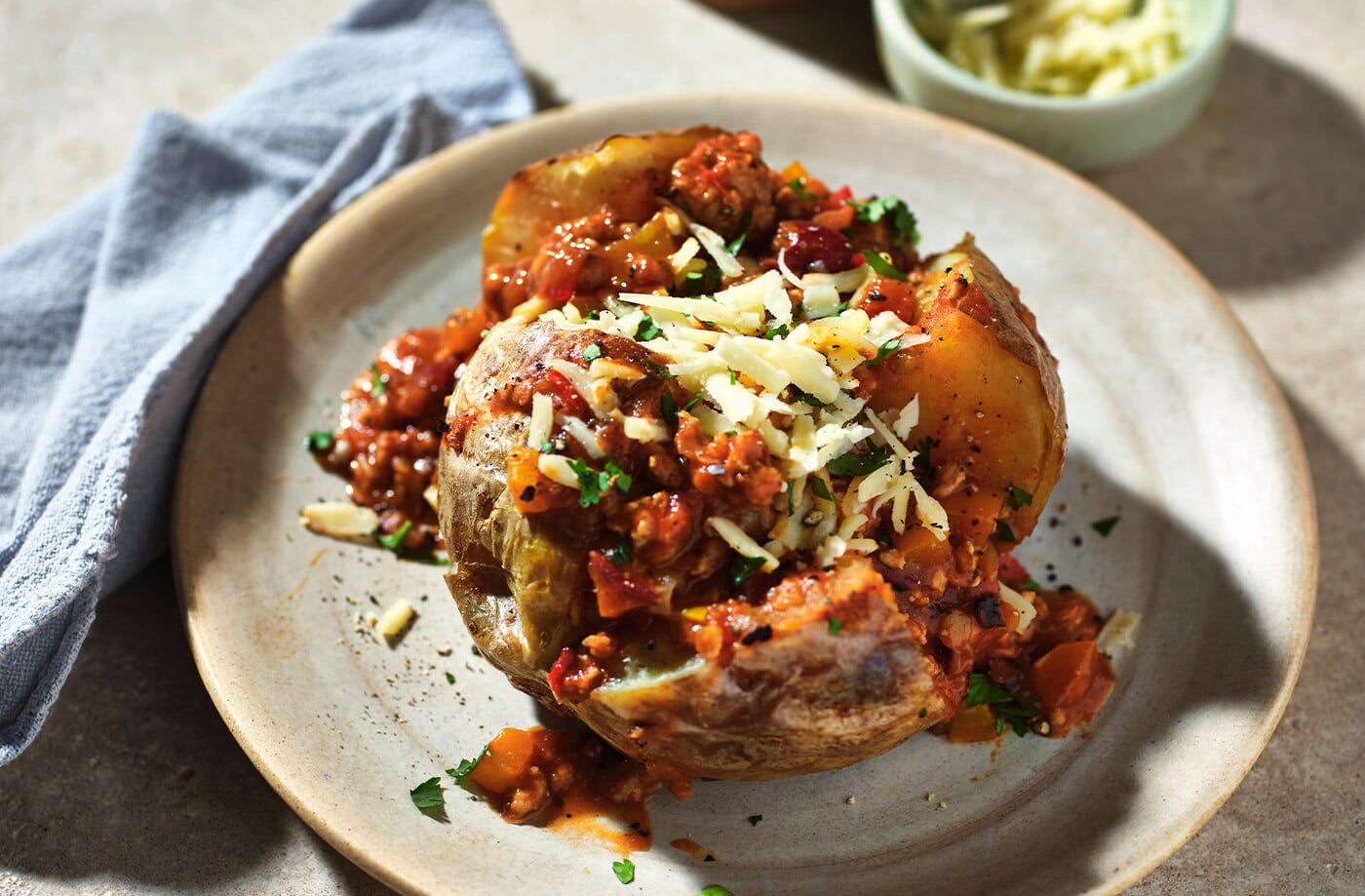 Baked potatoes with speedy chicken chilli recipe