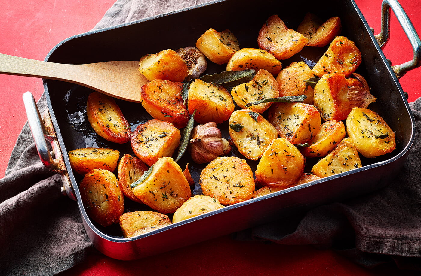 Herby triple-cooked roasties recipe