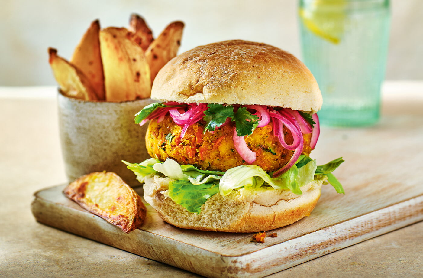 Spiced red lentil burgers with potato wedges recipe