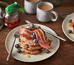 Vegan blueberry pancakes with crispy meat-free bacon | Tesco Real Food