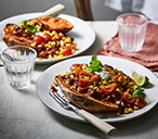 Baked Sweet Potatoes With Fajita Beans Recipe | Vegetarian Recipes | Tesco Real Food