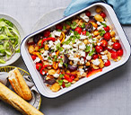 Crispy new potato, pepper and feta traybake | Tesco Real Food
