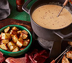 Cheese and beer fondue with dipping platter | Tesco Real Food