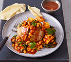 Jacket potatoes with curried beans and paneer | Tesco Real Food