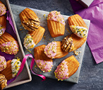 Rosé and pistachio dipped madeleines | Tesco Real Food