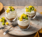 Mini mango and kiwi cheesecake pots | Tesco Real Food