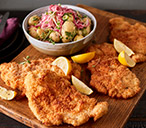 Czech-inspired chicken schnitzel​ with warm potato salad | Tesco Real Food