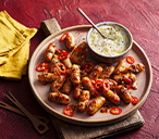 Sriracha-glazed cocktail sausages | Tesco Real Food