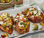 Sweet 'n' smoky jackets with corn salsa | Tesco Real Food