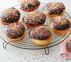 Chocolate dipped doughnuts with sprinkles | Tesco Real Food