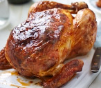 Spiced roast chicken with herb stuffing | Tesco Real Food