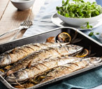 Roast mackerel with bay leaves and lemon | Tesco Real Food
