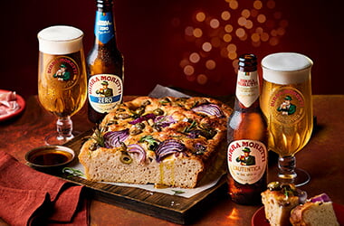 Festive focaccia with Parmesan, red onion and olive