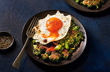 Broccoli fritters with anchovy fried eggs