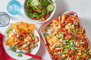 Buffalo-inspired chicken nachos