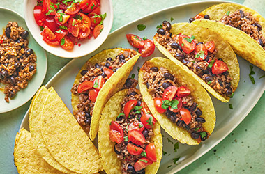 Pork tacos with black beans and salsa