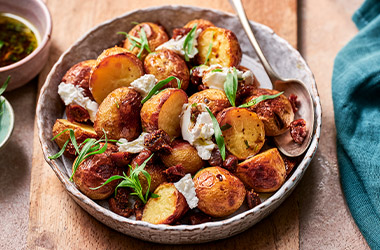Roast potatoes with crumbled goat's cheese