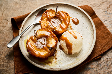 Spiced baked apples and toffee sauce