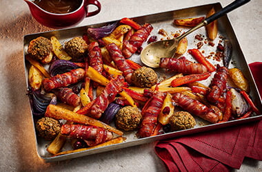 Jade Greenhalgh's sticky maple pigs in blankets traybake