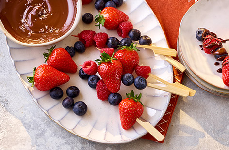 If you're looking for a speedy sweet treat, you'll love these mixed berry skewers. Served with a salted dark chocolate sauce, it's the perfect balance of refreshing and indulgent!