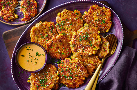 Zainab Pirzada's crispy sweetcorn fritters are great as part of an Iftar spread. Kimchi is good here for salty and funky flavours and a little bit of spice. Serve with a spicy sriracha and sesame sauce for dipping.


