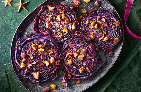 These vibrant red cabbage 'steaks' are roasted until tender and crispy and are topped with chestnuts for extra festive flavours. They'll make a deliciously different side for your Christmas dinner!