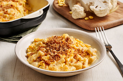 Kids will never know that this mac 'n' cheese is crammed with veg! The easy cheese sauce is made with 'hidden' cauliflower and sweetcorn, making it a  deliciously simple (and clever) way to sneak extra veg into family mealtimes.