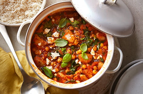 This hearty, healthy chicken stew is a great one-pot dinner idea, topped with basil and feta for a taste of the Mediterranean. With chickpeas and fresh greens, getting your family's veg in has never been more delicious. Serve with rice or crusty bread, if you like.