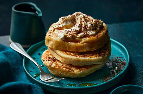 Give your pancakes a grown-up twist with this espresso martini version. Layer your fluffy pancakes up with coffee liqueur infused whipped cream and grate over a little dark chocolate for a perfect cocktail-inspired stack.