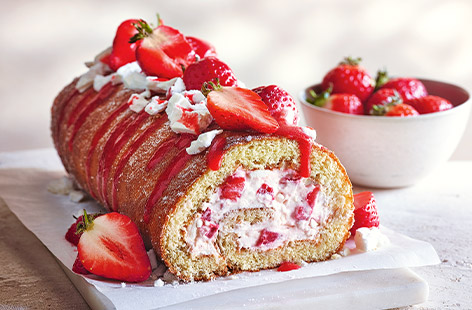 This gorgeous Swiss roll recipe is inspired by the classic summer pud: Eton mess, starring sweet and juicy seasonal strawberries. We've used readymade meringue to keep things really easy, which marries perfectly with the luscious whipped cream. A simple yet sophisticated end to a summer meal!