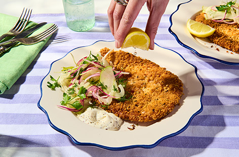 Golden, crispy and seriously satisfying, we give everyone’s favourite salty and squeaky cheese the schnitzel treatment for a fun veggie twist on a classic! The slaw adds freshness which cuts through the richness.