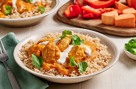 This simple curry is made with a secret 'hidden' ingredient... Sweet potato and red pepper are blitzed into the sauce to make sneaking veg into your family's dinner deliciously easy.