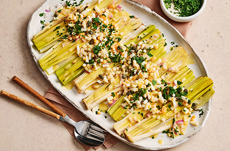 Here's our version of the French bistro classic: tender roasted leeks dressed in a tangy vinaigrette. Finished with soft eggs and fresh herbs, it's a simple dish with a big personality! Perfect as a starter or side.