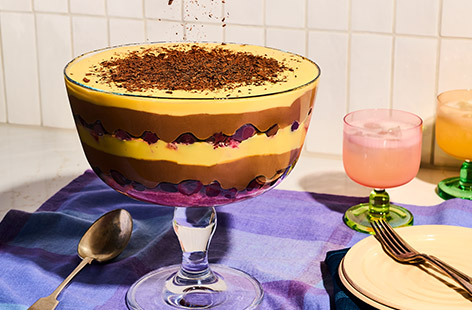 Seema’s zuppa inglese is a playful, grown-up twist on a classic Italian dessert, crafted to follow Big Zuu’s hearty lasagne perfectly. Light slices of lemon drizzle cake are soaked in a sweet, tangy cherry and vinegar syrup, then layered with silky vanilla and rich chocolate custard for a dessert that’s indulgent yet balanced.