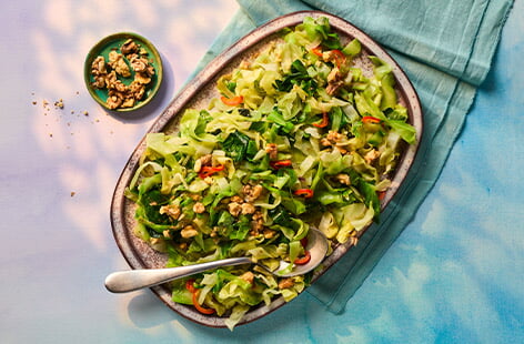 Shredded cabbage is a Sunday roast staple, but if you're looking for a new recipe, try this sweetheart cabbage recipe, a variety that's sweeter and more tender than regular cabbage. Pan-frying with garlic, chilli and shallots creates a lovely spicy sweetness, while the toasted walnuts lend earthy crunch. Perfect for your next Sunday lunch or Easter gathering.