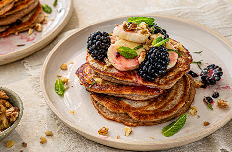 Here's a special banana pancake recipe! With warm spices and interesting textures, plus plenty of tangy berries, it certainly packs in the plant points and is a source of vitamin B12, which helps with energy levels. Nutritious but also indulgent-tasting, this makes a lovely weekend breakfast or brunch.