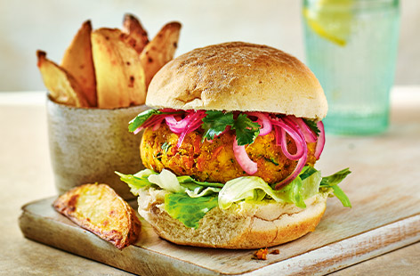What a wholesome treat these lentil burgers are. Providing 2 of your 5-a-day plus fibre and protein, this is one plant-based family meal you'll want to make on repeat. The burgers don't skimp on taste either, with garlic, herbs and spices boosting flavour without added salt, topped with a quick red onion pickle. Yum!