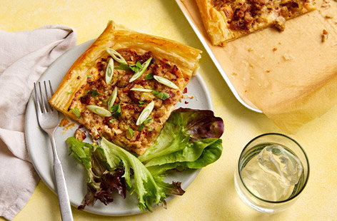 This recipe is a brilliant way to transform leftover sausage ragu into a delicious dish. Perfectly spiced and nestled on a puff pastry base, this tart is something you won't want to miss!