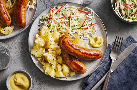 Sausages with fennel, apple and cabbage slaw 